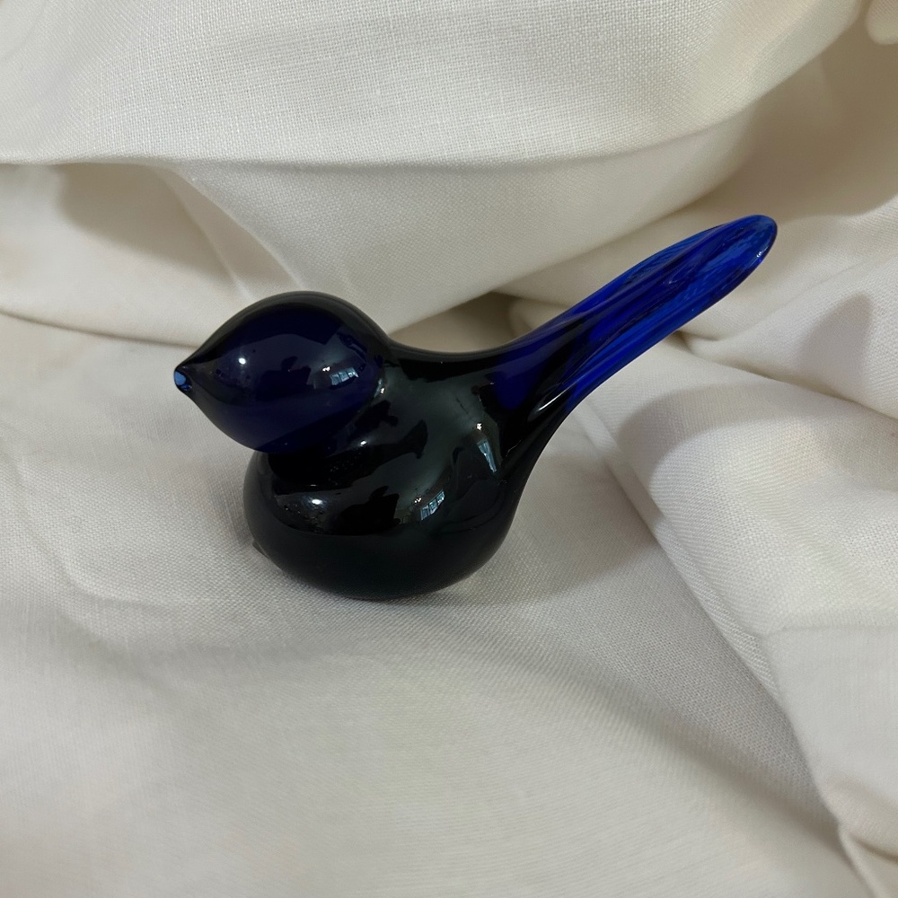 Small blue glass bird